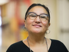 Maureen Yuzicappi, community health representative from Standing Buffalo Dakota First Nation, stands in the hall during the Breaking the Cycle of Diabetes Ambassador Training event, held at The Gathering Place on 3rd Avenue North.