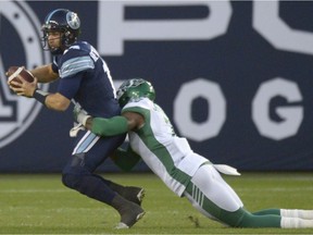 Despite some hiccups, the Saskatchewan Roughriders' defence ultimately got the better of the Toronto Argonauts and quarterback McLeod Bethel-Thompson, who is shown being sacked by Willie Jefferson on Saturday.