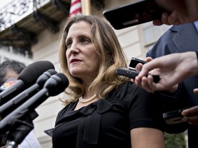 Chrystia Freeland, Canada's minister of foreign affairs, speaks to members of the media while arriving at the U.S. Trade Representative office in Washington, D.C., U.S., on Tuesday, Sept. 11, 2018.