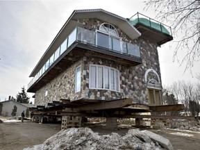 The two storey, 17,000 pound home that has sat forever at the corner of Clarence Ave. and College Drive will disappear as early as Thursday in the wee hours of the morning by Neufeld Movers, April 4, 2011. The new landlord of the the land wants the building gone to rebuild on the site.