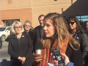 Canadian Union of Public Employees Local 1949 vice-president Meara Conway speaks with reporters about Legal Aid Saskatchewan outside Saskatoon provincial court on Friday, Sept. 28, 2018.
