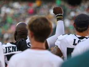 Philadelphia Eagles safety Malcolm Jenkins raises his fist during the playing of the national anthem before a pre-season game against the Pittsburgh Steelers on Aug. 9.