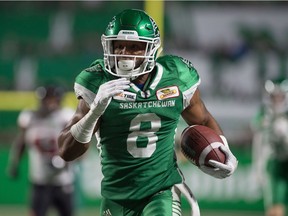The Saskatchewan Roughriders' Marcus Thigpen returns the opening kickoff 97 yards for a touchdown Saturday against the visiting Ottawa Redblacks.