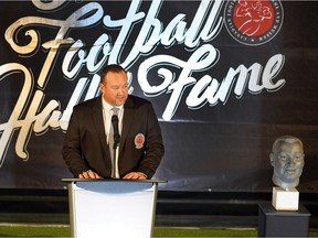 Scott Flory makes his induction speech during Canadian Football Hall of Fame induction ceremonies on Friday in Hamilton.