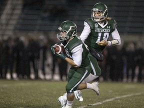 Kyle Siemens, handing the ball to Adam Machart during a recent game, starts Saturday when the Huskies host Manitoba.