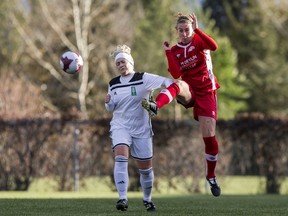 Saskatchewan Impact striker Michelle Keene battle for the ball with BC Surrey United SC defence Courtney Duncan during the opening day at the Canadian club soccer championships  in Saskatoon, SK on Wednesday, October 3, 2018.