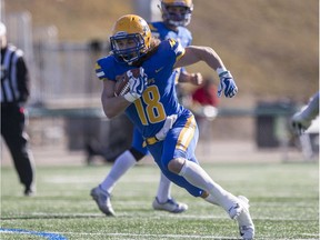 Saskatoon Hilltops running back Josh Ewanchyna moves the ball against the Winnipeg Rifles at SMF Field in Saskatoon on Sunday, Oct. 14, 2018.