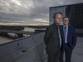 Gregory Burke, left, Remai Modern executive director and CEO and Scott Verity, chair of the Remai Modern board, stand for a photograph on the roof top patio at the Remai Modern in Saskatoon, SK on Tuesday, October 16, 2018.
