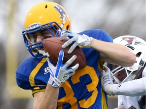 Saskatoon Hilltops' Jason Price catches the ball during the 2017 Prairie Football Conference final against Regina Thunder at SMF Field in Saskatoon on October 22, 2017.