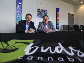 Corey Tyacke with 5Buds Cannabis retails stores and Synergy 5 Investments president Sean Willy pose for a picture in the English River Business Complex near Saskatoon on Oct. 25, 2018.