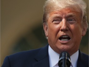 U.S. President Donald Trump speaks during a press conference to discuss the revised U.S. trade agreement with Mexico and Canada in the Rose Garden of the White House on October 1, 2018 in Washington, DC.