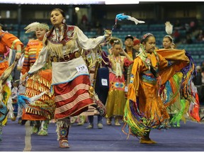 Dancers dance at the 2014 FSIN Powwow at the Sasktel Centre on November 2, 2014.