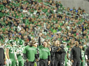 Saskatchewan Roughriders head coach Chris Jones, shown raising a fist while calling a defensive play earlier this season, is preparing for Monday's pivotal CFL West Division game against the visiting Edmonton Eskimos.