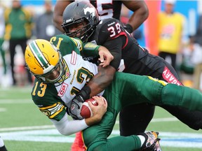 Charleston Hughes and the Edmonton Eskimos go way back. In 2015, Hughes — then of the Calgary Stampeders — is shown sacking Eskimos quarterback Mike Reilly.