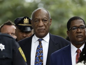 FILE - In this Sept. 24, 2018, file photo, Bill Cosby departs after a sentencing hearing at the Montgomery County Courthouse in Norristown, Pa. Cosby's trial judge is rejecting the actor's bid for a new trial or sentencing hearing and directing him to file any appeals with the state Superior Court. Cosby is serving a three- to 10-year state prison term after a jury this year convicted him of drugging and molesting a woman at his home in 2004.