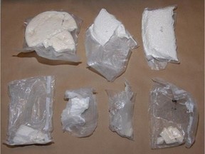Packaged crack cocaine and powder cocaine seized by police in a massive bust in Prince Albert, Saskatchewan on Aug. 18, 2016. (Prince Albert Police photo)