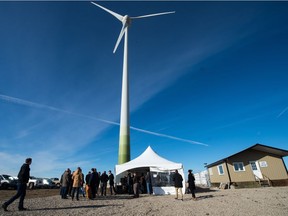 People gather for a media event at the Renewable Energy Storage Facility owned by Cowessess First Nation located east of Regina.