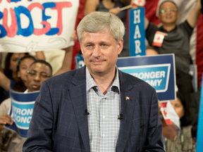 The populist PM? People cheer for Stephen Harper at a rally in 2015.