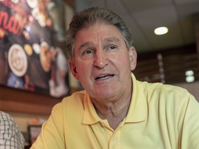 Democrat Senator Joe Manchin speaks about his recent vote in the Senate to confirm Brett Kavanaugh, Sunday, Oct. 7, 2018 at IHOP Charleston W.Va. A day after Manchin broke with his party on what may be the most consequential vote of the young Trump era, the West Virginia Democrat faces a political firestorm back home.