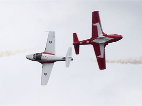 The 431 Air Demonstration Team (Snowbirds) fly at the "Canada Remembers Armed Forces Day -- Salute to Heroes" air show at 17 Wing Detachment Dundurn on June 11, 2017.