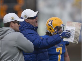 Hilltops Head Coach Tom Sargeant talks to a referee during the Prairie Football Conference at SMF Field in Saskatoon,Sk on Sunday, October 28, 2018.