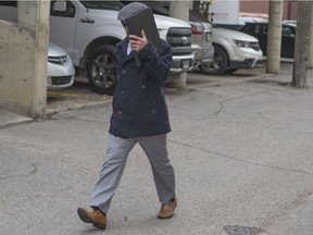 Rhett Lundgren, the former Walter Murray teacher charged with child sex offences walks out of Queens Bench in Saskatoon,Sk on Friday, November 2, 2018.