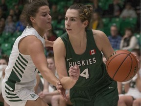Huskies guard Brianna Fehr dribbles the ball during a Canada West women's basketball game at the PAC gym in Saskatoon on Saturday, Nov. 3, 2018.
