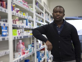 Michael Kani stands for a portrait at his independent pharmacy in Saskatoon,Sk on Monday, November 19, 2018.