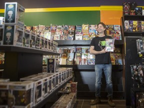 Lee Pearson, owner of Bridge City Comics and Collectables, stands for a photograph in his store in Saskatoon, SK on Wednesday, November 21, 2018. The store will be receiving a limited edition Archie Comic cover being released to the comic book shops that support ComicBooks For Kids. Bridge City Comics and Collectables will be the only comic book store in Canada to receive the limited edition cover.