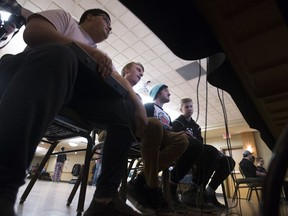 (L to R) Josh Maza, Ryan Hoppe, Mike Farthing and Carter Graham compete during a SuperSmash tournament at the Travelodge Hotel in Saskatoon on Saturday, Nov. 24, 2018.