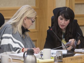 City councillor Bev Dubois talks to councillor Sarina Gersher during the budget deliberations at City Hall in Saskatoon,Sk on Monday, November 26, 2018.