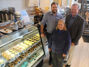 Manager Chris Whittington, left, stands with his parents and co-owners of HomeQuarter Coffeehouse and Bakery Lee Whittington and Grace Whittington in Saskatoon, Sask. on Nov. 22, 2018. The family recently opened up HomeQuarter Coffeehouse and Bakery which hopes to become a coffee-focused staple here in Saskatoon.