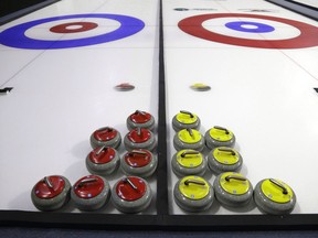 Curling rocks are shown Friday, Feb. 10, 2017, during a media demonstration the day before the opening ceremonies of the USA Curling Nationals in Everett, Wash. The good news for curling is new rinks are opening. The bad news is even more are closing.