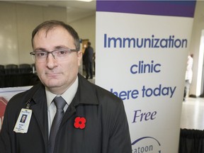 Dr. Simon Kapaj, Deputy Medical Health Officer for the Saskatchewan Health Region, at a free flu shot clinic at Station 20, Monday, October 31, 2016.
