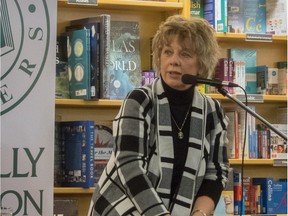 Joanne Paulson answers a question during the launch of her latest novel, Broken Through, at McNally Robinson book store in Saskatoon on Nov. 21, 2018. (photo by Ken Paulson)