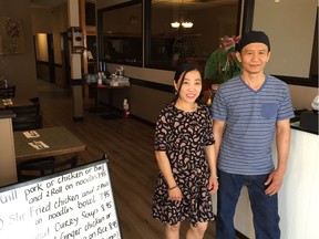 Thao Nguyen (left) and her husband Thang Huynho inside Bun's House Restaurant in Saskatoon on October 24, 2018. (Erin Petrow/ Saskatoon StarPhoenix)