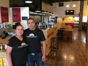 Daniel Godinez (right) and his mother, and regular fixture in the restaurant's kitchen, Maria Munoz inside Mexihco Restaurant on 2nd Avenue North in Saskatoon, on November 8, 2018. (Erin Petrow/ Saskatoon StarPhoenix)