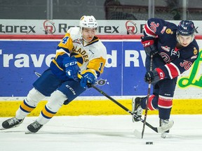 The Saskatoon Blades' Gary Haden (14) played against his former Medicine Hat Tigers teammates on Tuesday in a 4-2 win by the Blades.