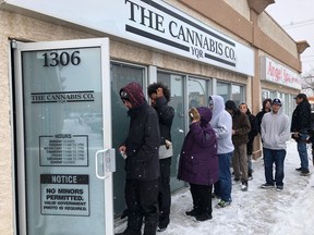 People line up outside The Cannabis Co. YQR in Regina on opening day. The store is the first legal cannabis retailer to open in city limits.