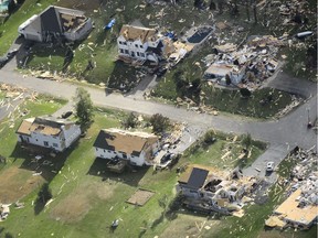 Damage from a tornado is seen in Dunrobin, Ont., west of Ottawa on Saturday, Sept. 22, 2018. The storm tore roofs off of homes, overturned cars and felled power lines in the Ottawa community of Dunrobin and in Gatineau, Que.