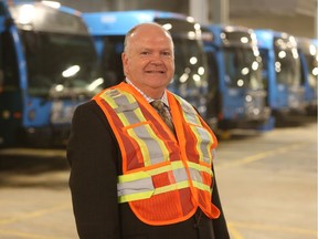 Jim McDonald, the City of Saskatoon's director of transit, stands with city busses in the civic operations centre on Dec. 6, 2018.