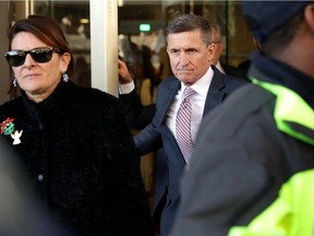 Former White House National Security Advisor Michael Flynn and his wife Lori Andrade leave the Prettyman Federal Courthouse following a sentencing hearing in U.S. District Court December 18, 2018 in Washington, DC. Flynn's lawyers accepted the judge's offer to delay sentencing for lying to the FBI about his communication with former Russian Ambassador Sergey Kislyak. Special Prosecutor Robert Mueller has recommended no prison time for Flynn due to his cooperation with the investigation into Russian interference in the 2016 presidential election.