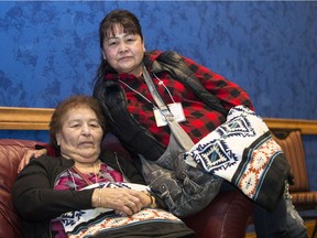Ernestine McDonald, left, 73, broke three ribs when the West Wind Aviation airliner she was in crashed moments after taking off from the Fond du Lac airport on Dec. 13, 2017, and her daughter, Brenda McDonald, was also on the flight, sit for a photograph following a ceremony honour those involved in the crash at the FSIN assembly at Dakota Dunes outside Saskatoon, SK on Wednesday, November 28, 2018.