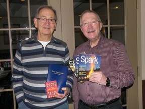 Local Gideons, Ron Basky (left) and Clair Ziolkowski, display some of the materials distributed by Gideons International in Canada. (Darlene Polachic photo for the Saskatoon StarPhoenix for Religion column on Saturday, Dec. 8, 2018)