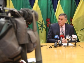 Don Morgan, Saskatchewan's minister of justice, speaks with members of the media at the Saskatoon Cabinet offices on Dec. 10, 2018.