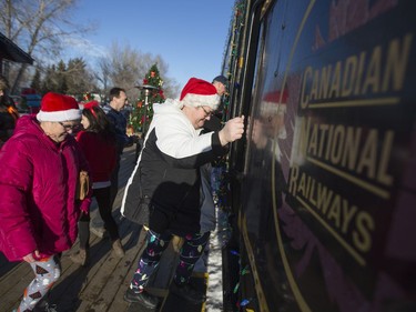 Attendees board the train during the Magical Christmas Express train that travels from Wakaw to Cudworth near Wakaw,Sk on Saturday, December 15, 2018.