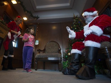 Anika Koehncke-Mayer walks in to meet Santa during the Magical Christmas Express train that travels from Wakaw to Cudworth near Wakaw,Sk on Saturday, December 15, 2018.