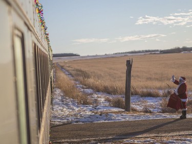 Santa waves to train passengers  during the Magical Christmas Express train that travels from Wakaw to Cudworth near Wakaw,Sk on Saturday, December 15, 2018.