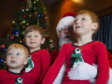 (L to R) Brayden Kun, Ethan Kun and Jordan Kun sit on Santa's lap during the Magical Christmas Express train that travels from Wakaw to Cudworth near Wakaw,Sk on Saturday, December 15, 2018.