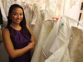Jeanny Buan, owner of Mylynh Bridal, is surrounded by dresses at her Idylwyld Drive bridal shot on Dec. 12, 2018. The new owner of the shop, she said she hopes to provide a safe space for all of her customers while continuing to supply the customer service the location is known for.